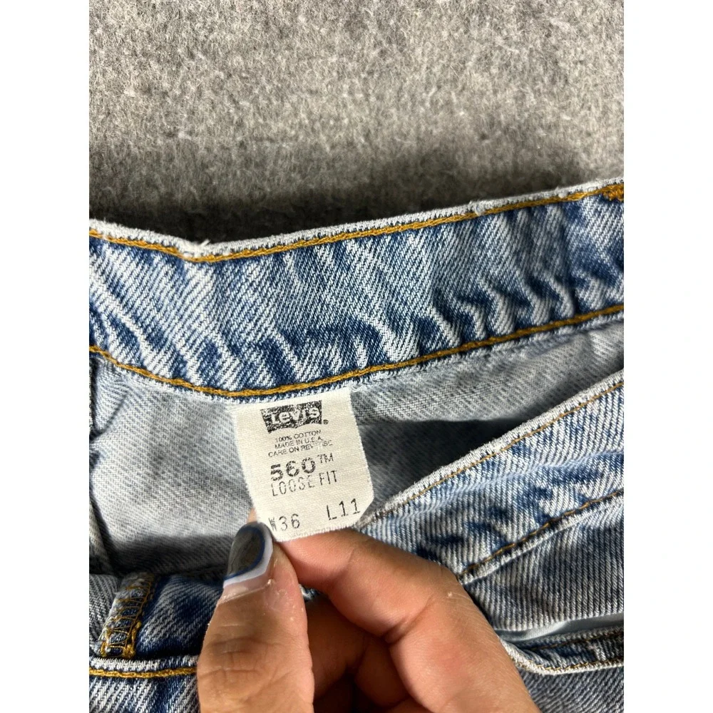 Vintage Levis 560 Loose Fit Denim Shorts Mens 36 Light Wash Blue Made in USA 90s